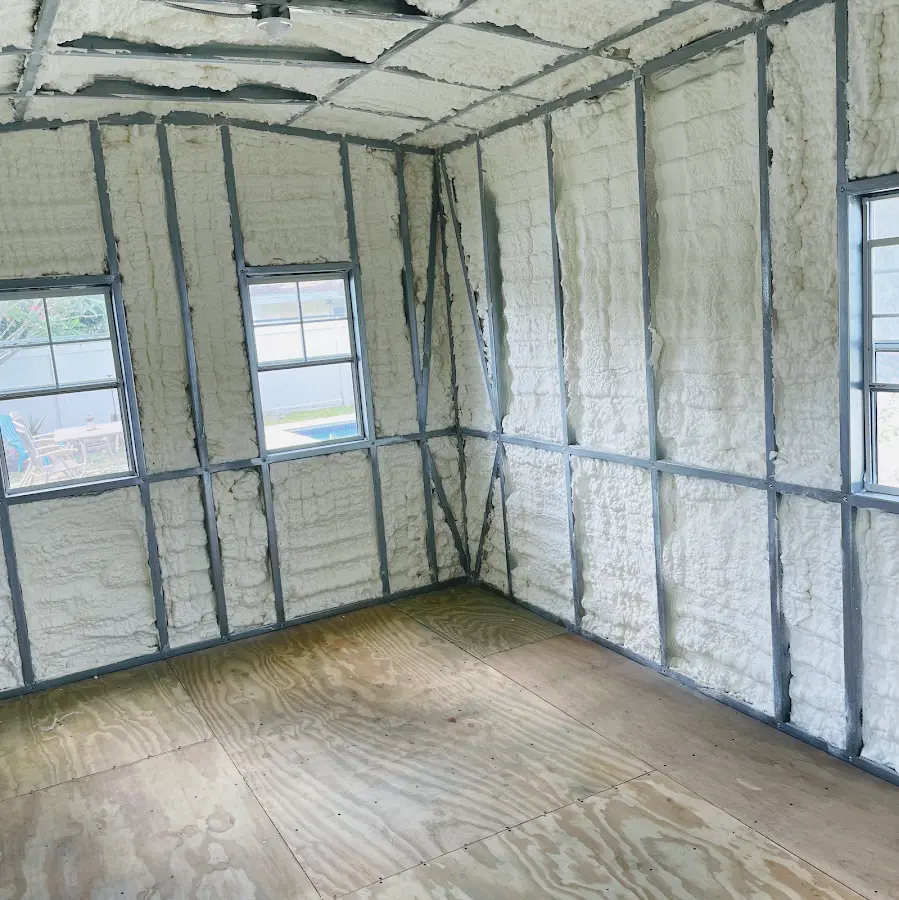 Closed-cell spray foam insulation applied to wall cavities in a residential project in Clemmons